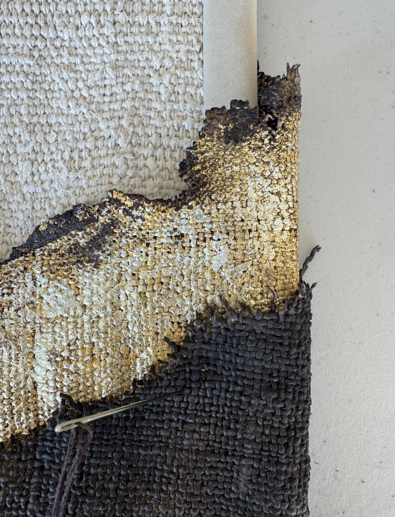 Detail of current work by Laura Nacke/Laura Roberts. Landscape of Blessings, textile art gold leaf, burned fabric